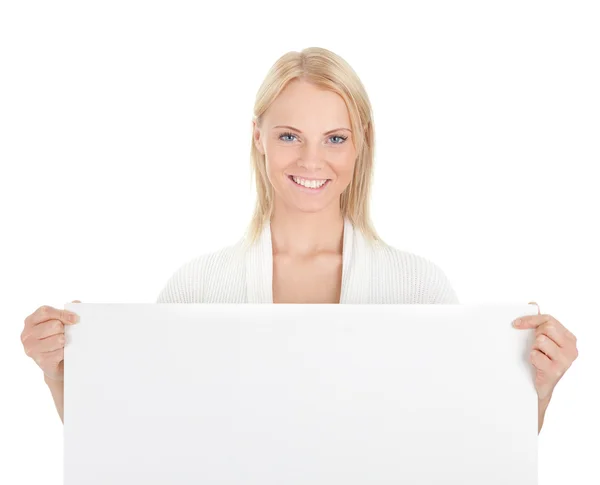 Beautiful young woman presenting empty board — Stock Photo, Image