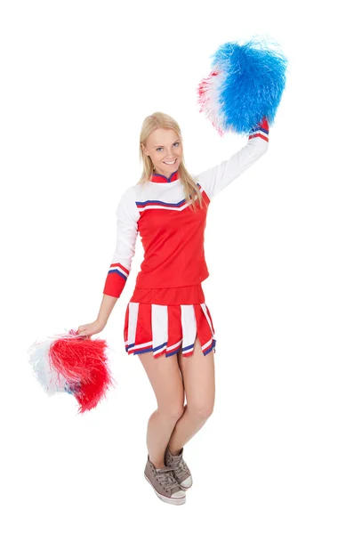 Sorridente bella cheerleader con pompon . — Foto Stock