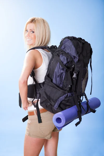 Beautiful young woman with backpack — Stock Photo, Image
