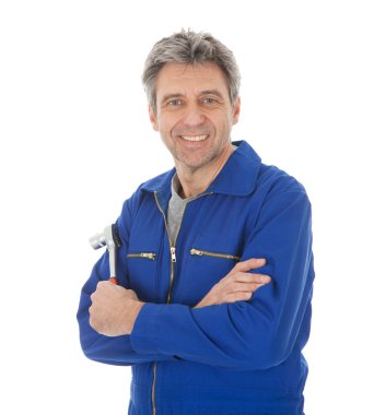 Portrait of automechanic holding a wrench clipart