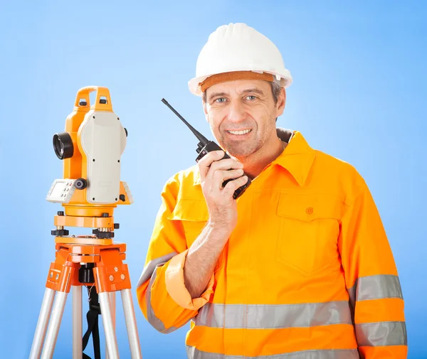 Senior land surveyor with theodolite — Stock Photo, Image
