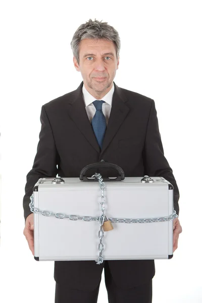 Homme d'affaires tenant une valise en métal — Photo