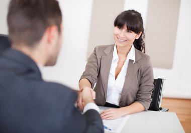 Young businesswoman at the interview clipart