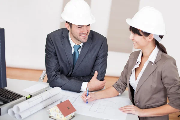 Two young architects in the meeting — Stock Photo, Image