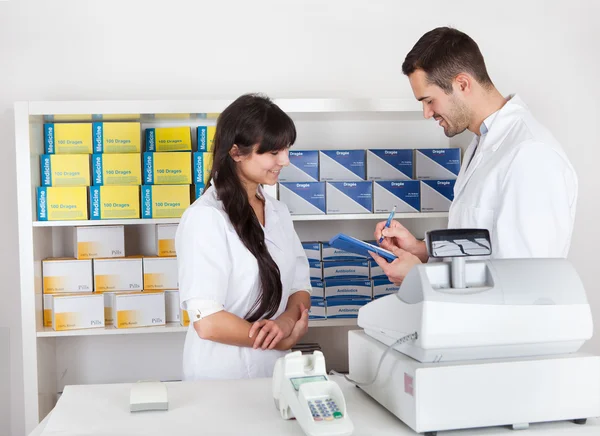 Pharmacists checking drugs — Stock Photo, Image