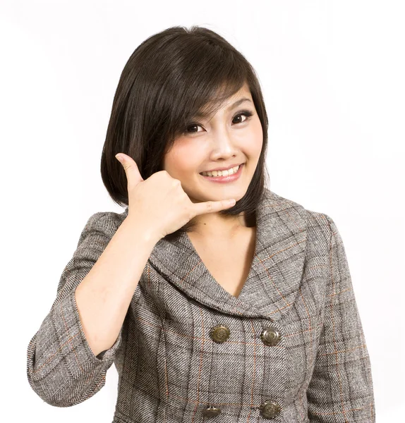 Unga företag kvinna gör call gest — Stockfoto