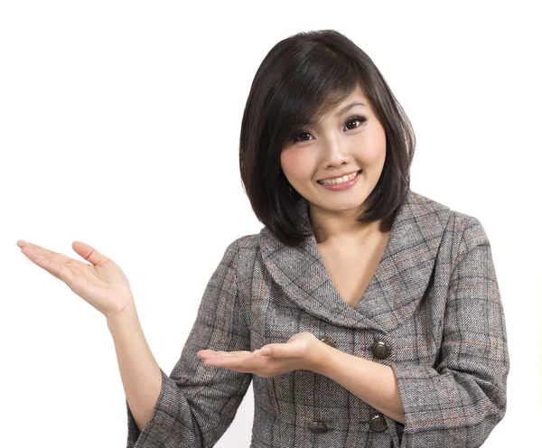 Young business woman presenting something — Stock Photo, Image