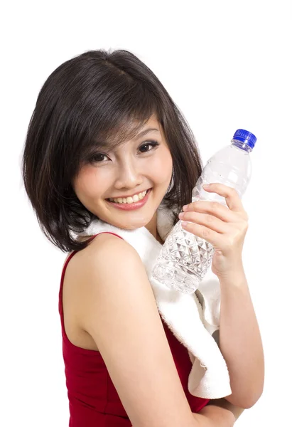 Muito asiático menina segurando garrafa após o exercício — Fotografia de Stock