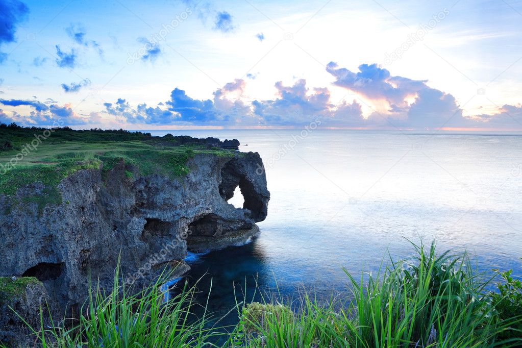 Sunset on the rocks , in Okinawa , Manzamo
