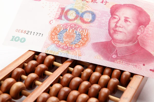Abacus and china money banknote — Stock Photo, Image