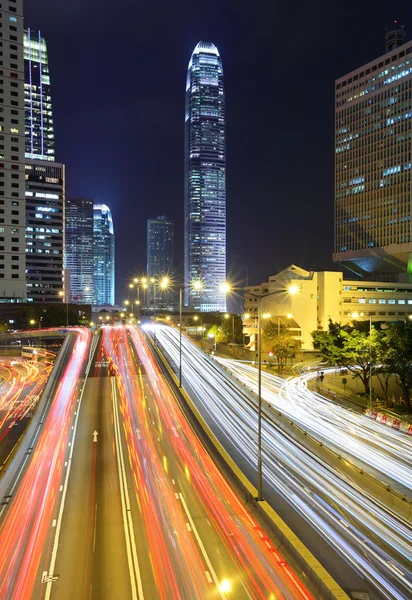 stock image Traffic through downtown at night