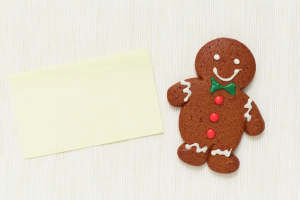 Gingerbread man met memo papier — Stockfoto