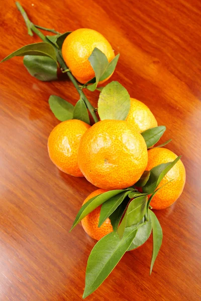 Mandarin on wooden background — Stock Photo, Image