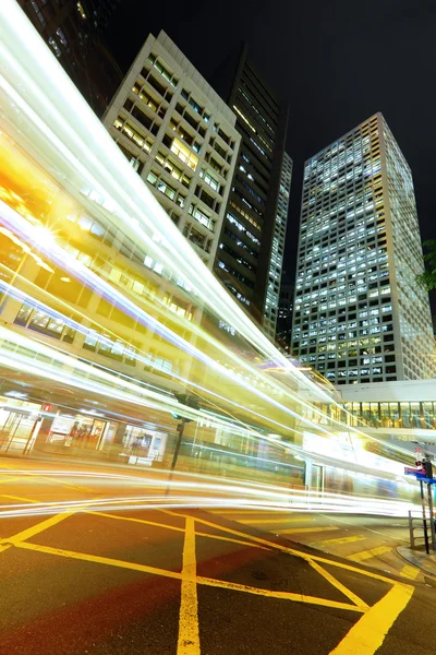 Light trails in modern city — Stock Photo, Image