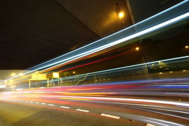 Light trails in mega city highway clipart