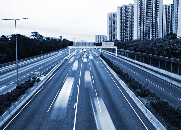 stock image Traffic on highway in blue