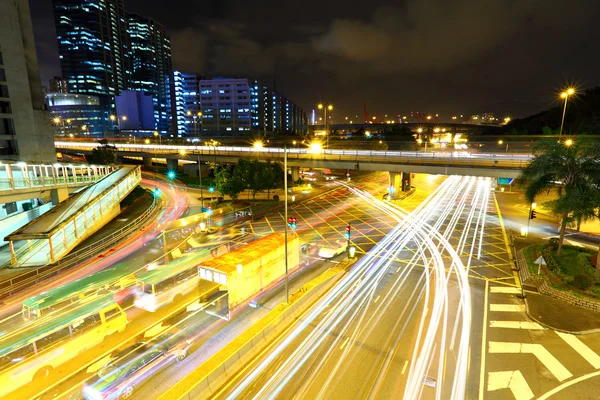 Traffic in downtown at night — Stock Photo, Image