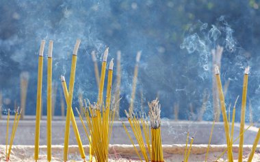 Incense sticks in chinese temple clipart