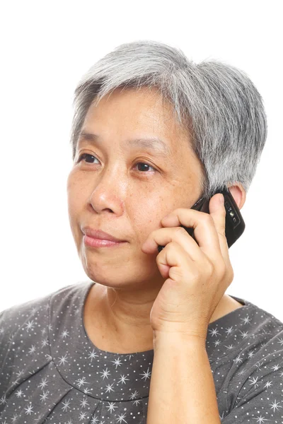 Dojrzałe kobieta za pomocą telefonu komórkowego — Zdjęcie stockowe
