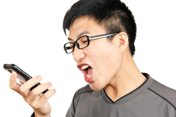 Homem grita para o seu telefone — Fotografia de Stock