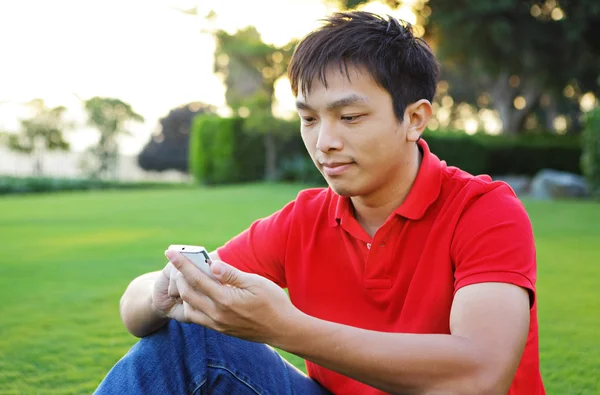 Texting messages on phone — Stock Photo, Image