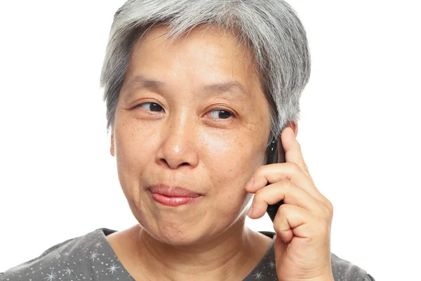 Mature woman using mobile phone — Stock Photo, Image