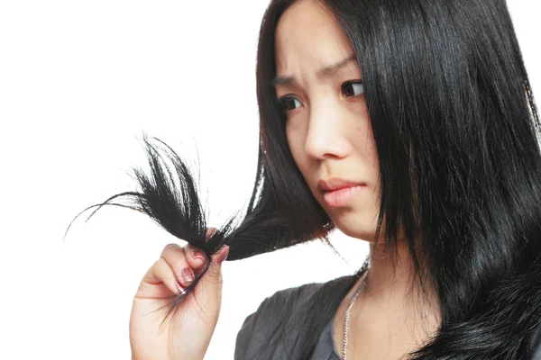 stock image Young woman have hair problem