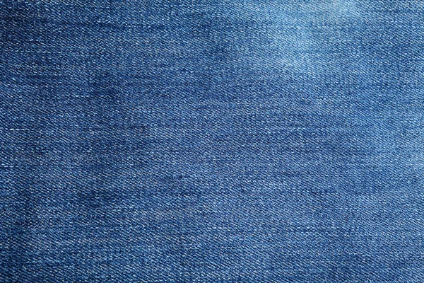 Складчатая текстура джинса — стоковое фото