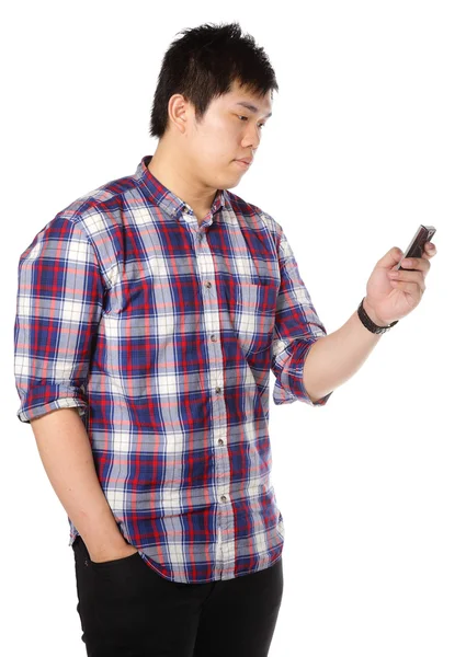 Człowiek sms na telefon komórkowy — Zdjęcie stockowe