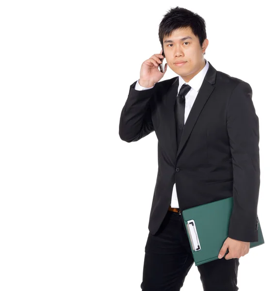 Young asian business man with file and phone — Stock Photo, Image