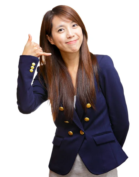 Young asian girl making a call me gesture — Stock Photo, Image