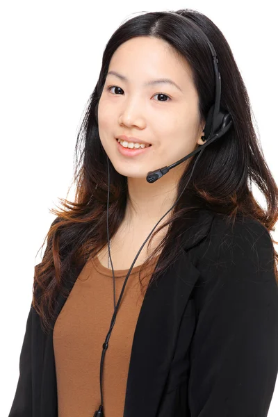 Asijské ženy sluchátky a mikrofonem — Stock fotografie