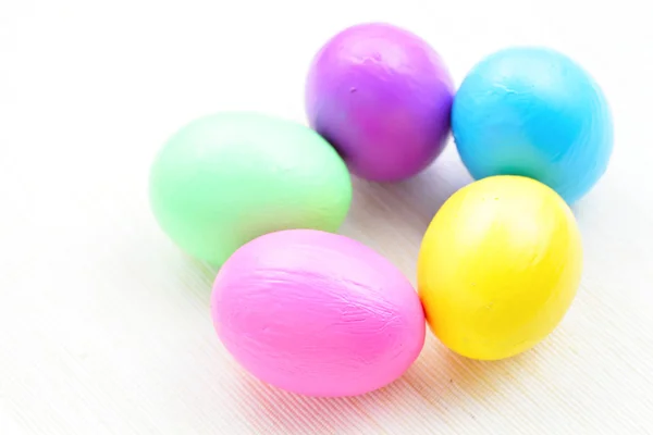Children paint colorful easter eggs — Stock Photo, Image