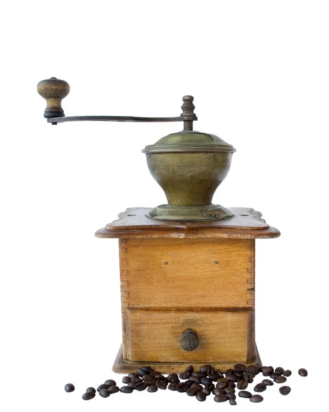 Ancient coffee grinder and the coffee grains Stock Photo