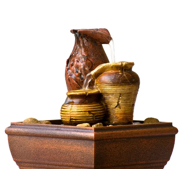 Decoratieve potten met stromend water Rechtenvrije Stockafbeeldingen