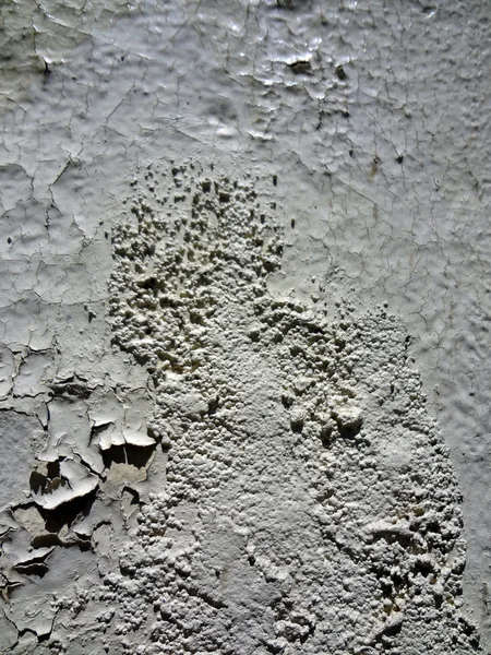 Gebarsten witte verf patroon op de muur — Stockfoto