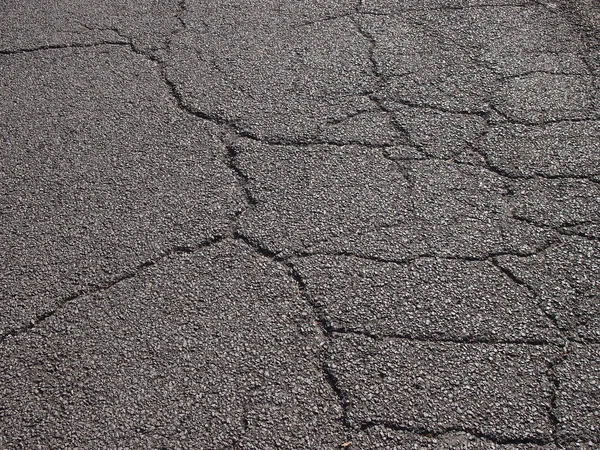 Pęknięty asfalt wzór — Zdjęcie stockowe