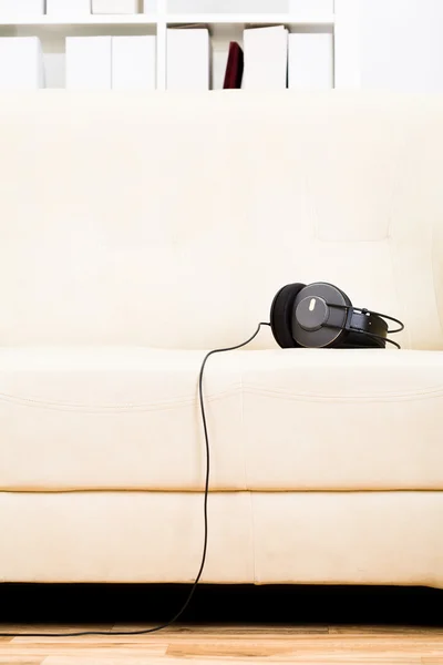 Living room with headphone — Stock Photo, Image