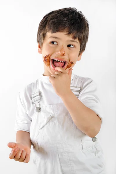 Child eat cake — Stock Photo, Image