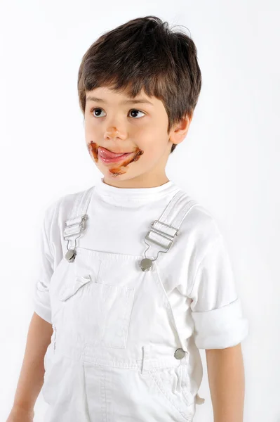 Barnet äta tårta — Stockfoto