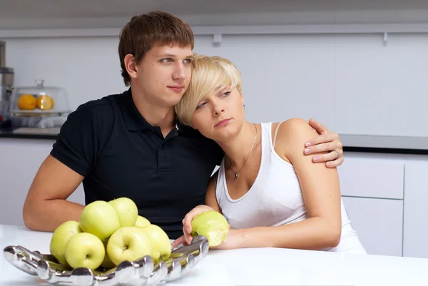 stock image Happy couple posing in the kitchen