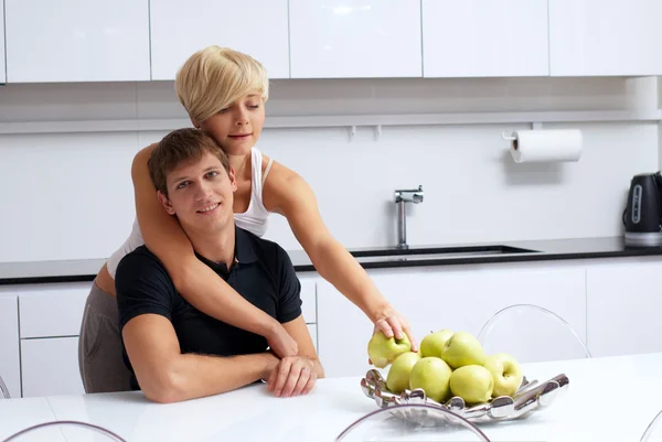 stock image Happy couple posing in the kitchen