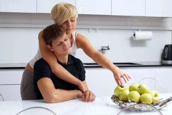 stock image Happy couple posing in the kitchen