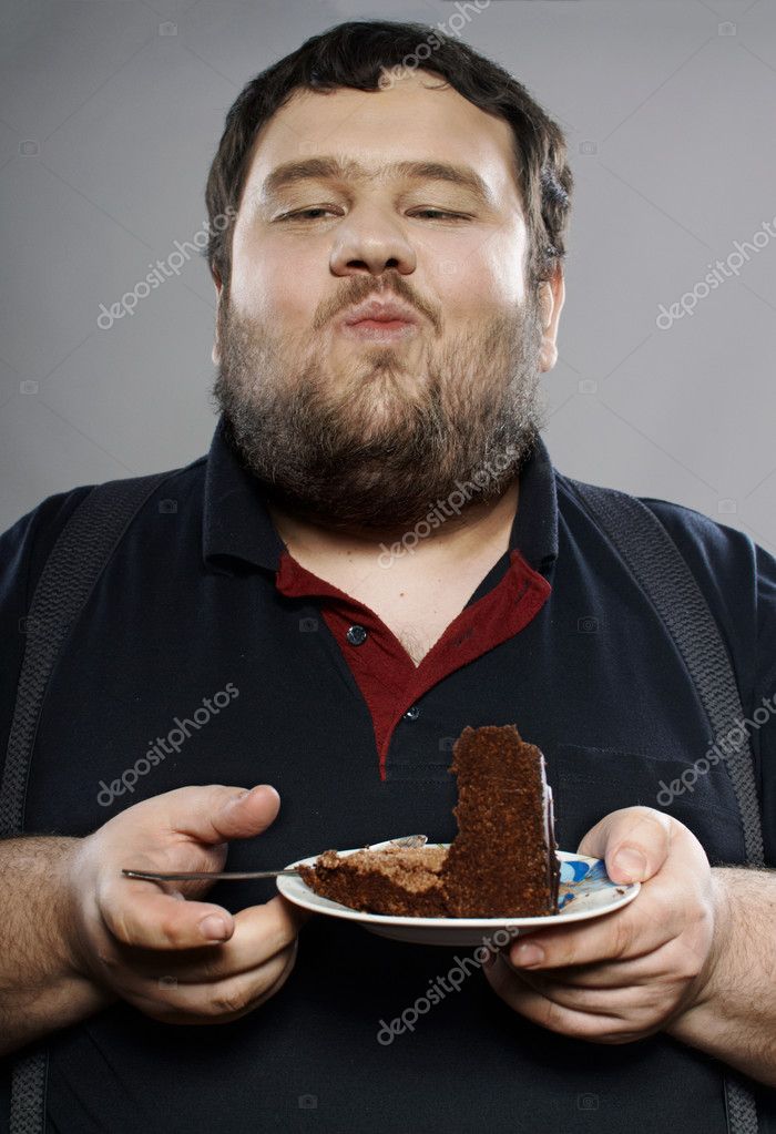Funny fat guy eating chocolate cake Stock Photo by ©dmitryzubarev 8175876