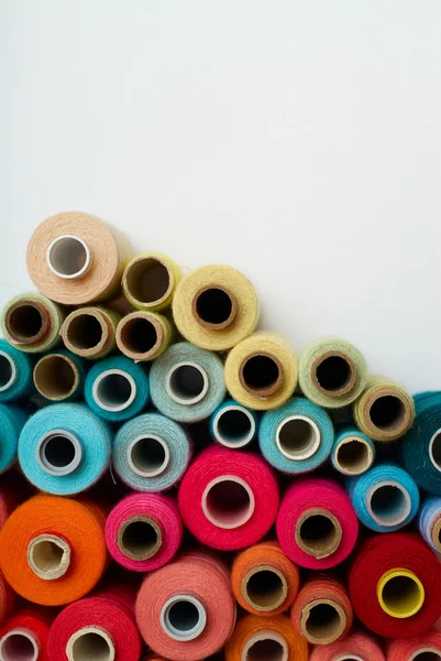 Colored bobbins — Stock Photo, Image