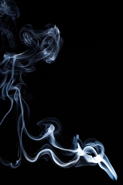 Abstract smoke from incense stick isolated on black smoke background