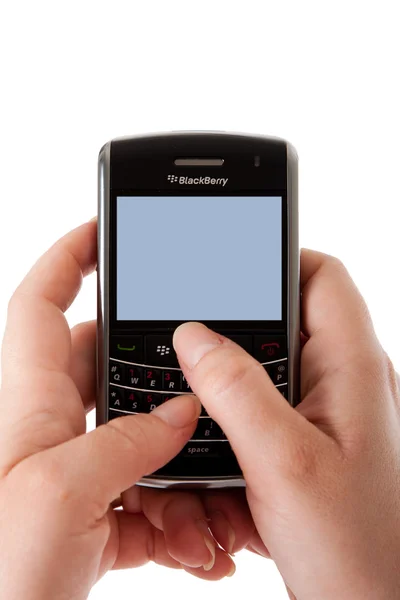 Blackberry smartphone user hands — Stock Photo, Image