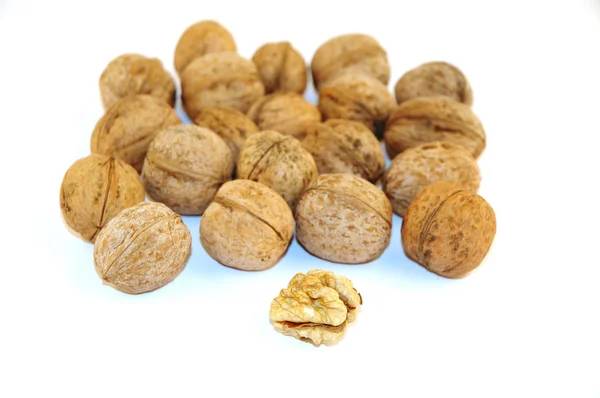 Nutmeat and nuts on white background — Stock Photo, Image