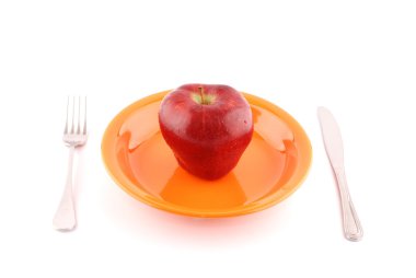 Fresh apple on a plate clipart
