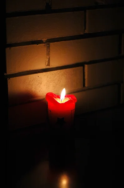 Červená svíčka — Stock fotografie